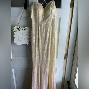 Only worn once, for prom, basically brand new, no snags or tears or stains,